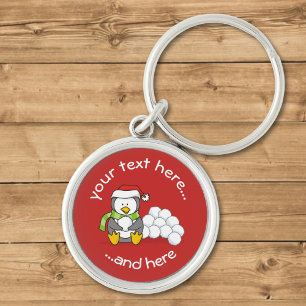 Christmas Penguin Sitting with Snow Balls Keychain