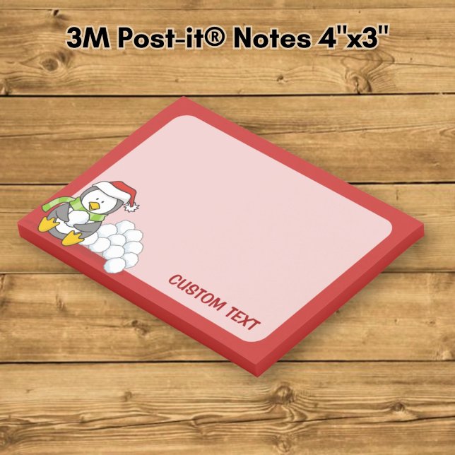Christmas penguin sitting with snow balls post-it notes (Creator Uploaded)