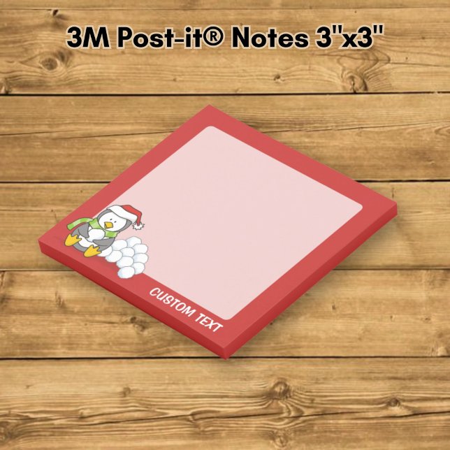 Christmas penguin sitting with snow balls post-it notes (Creator Uploaded)