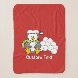 Christmas penguin sitting with snow balls sherpa blanket