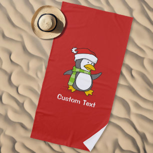 Christmas penguin walking on snow beach towel