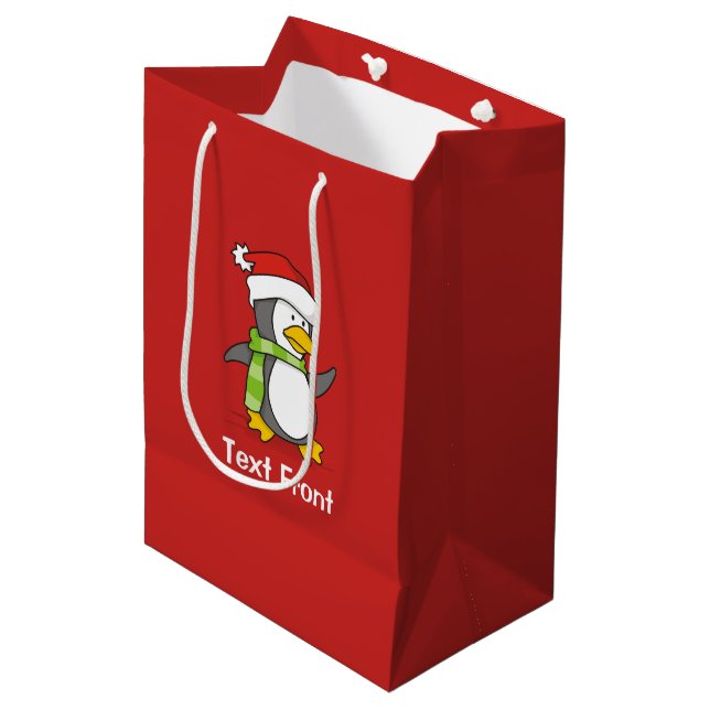Christmas penguin walking on snow medium gift bag (Front Angled)