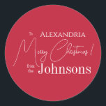 Christmas Personalised Red Family Classic Round Sticker<br><div class="desc">This is a personalised, modern, Merry Christmas design. It is in festive red and white and has the message, "To Alexandra" "Merry Christmas! from the Johnsons". Ideal for your Christmas gift wrap and party favour seals this festive season. To personalise, simply add the to name and your name in the...</div>