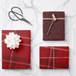 Christmas plaid classic red holiday wrapping paper sheet<br><div class="desc">A bold modern take on a classic holiday plaid makes this wrapping paper set perfect way for both traditional and unconventional gift givers. The red background with the tilted black and white checks is festive and stylish. Will look fantastic on all your gifts under the tree perfectly coordinated with your...</div>