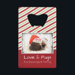 Christmas Pug in Santa Hat with Christmas Lights<br><div class="desc">A bottle opener with an adorable photo of a pug puppy sleeping while wearing a santa hat. Merry Christmas is written on the band of his hat, in a trendy handwritten font. A grunge border with colourful Christmas lights surround the frame of this cute photo. The background is a festive...</div>