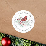 Christmas Red Cardinal Winter Return Address Label<br><div class="desc">Add the finishing touch to your Christmas cards and holiday mail, with these beautiful winter themed round return address labels, featuring a cute watercolor red cardinal perched on a snow-covered pine branch, decorated with sprigs of holly berries. If you would like design tweaks or want the design on more products,...</div>