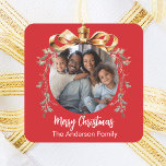 Christmas red gold bauble family photo square sticker<br><div class="desc">Red background. Personalise and add your own photo.  A golden Christmas tree bauble as frame. Add your family name.</div>