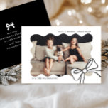 Christmas Simple Bow Black and White Photo Holiday Card<br><div class="desc">This festive black and white Christmas card features a stylish elegant bow and a trendy wavy centre photo. The classy black back includes an editable Christmas greeting message with your custom name,  and is sure to have friends and family ready to celebrate this happy holiday season!</div>