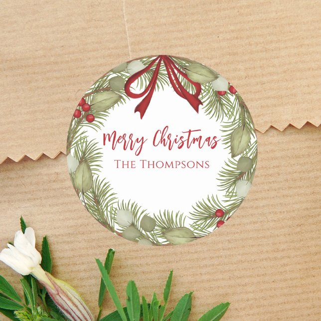 Christmas Simple Red Holly Berries Pine Wreath  Classic Round Sticker (Christmas holiday greenery and red holly berries wreath with red ribbon sticker. )