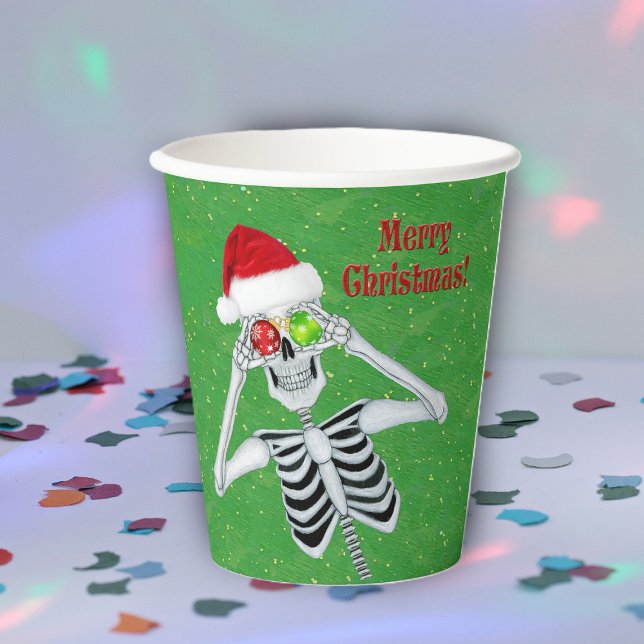 Christmas Skeleton Snowflake Ornaments Hat  Green Paper Cups (Fun Merry Christmas skeleton ornament eyes Santa Hat on green party drinking paper cups.)
