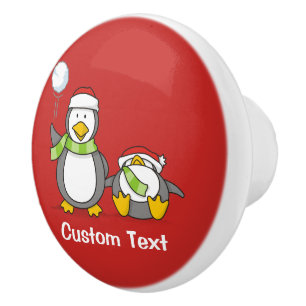 Christmas Snowballing penguins Ceramic Knob