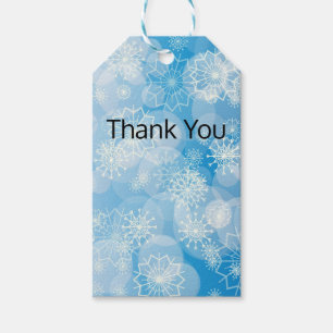 Christmas snowflakes on a blue background        gift tags