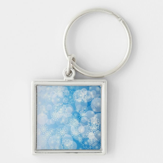 Christmas snowflakes on a blue background          key ring (Front)