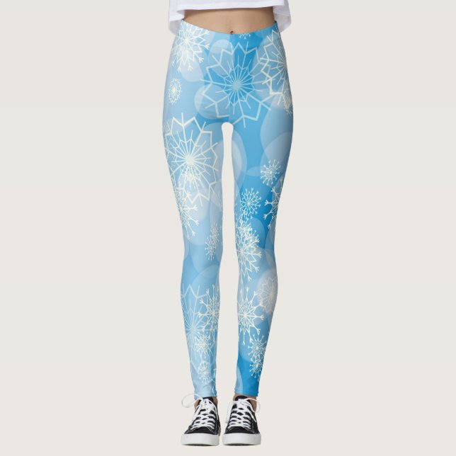 Christmas snowflakes on a blue background      leggings (Front)
