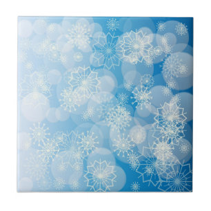 Christmas snowflakes on a blue background        tile