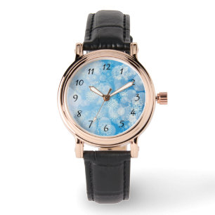 Christmas snowflakes on a blue background watch