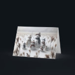Christmas Snowman Family<br><div class="desc">Family of snowmen stand in a snowy field each wearing cosy hats and scarves surrounded with tall grass
All text can be changed.</div>