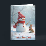Christmas Snowman With Bunny Holiday Card<br><div class="desc">A snowman wearing a red hat and scarf stands cheerfully beside a small bunny,  also dressed warmly,  surrounded by a snowy landscape with gentle snowfall.
Text can be changed.</div>