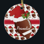 Christmas Sport Football Santa Hat Ceramic Tree Decoration<br><div class="desc">Football Christmas Ornament. 100% Customise-able. Ready to Fill in the box(es) or Click on the CUSTOMIZE IT button to change, move, delete or add any of the text or graphics. Made with high resolution vector and/or digital graphics for a professional print. NOTE: (THIS IS A PRINT. All zazzle product designs...</div>