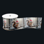 Christmas Squirrel On Snowy Tree Branch Satin Ribbon<br><div class="desc">A squirrel wearing a Santa hat is perched on a snow-covered branch in a wintry forest,  with sunlight filtering through the trees</div>