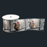 Christmas Squirrel On Snowy Tree Branch Satin Ribbon<br><div class="desc">A squirrel wearing a Santa hat is perched on a snow-covered branch in a wintry forest,  with sunlight filtering through the trees</div>