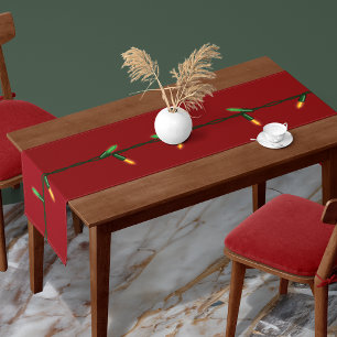 Christmas String Lights On Red Table Runner