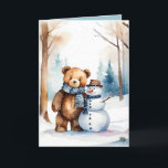 Christmas Teddy Bear And Snowman Holiday Card<br><div class="desc">Cute watercolor brown teddy bear in winter woods with snowman.
Text is editable.</div>