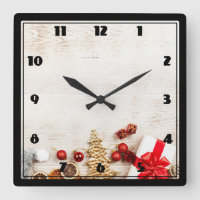 Christmas Themed Items on a Rustic Wooden Board