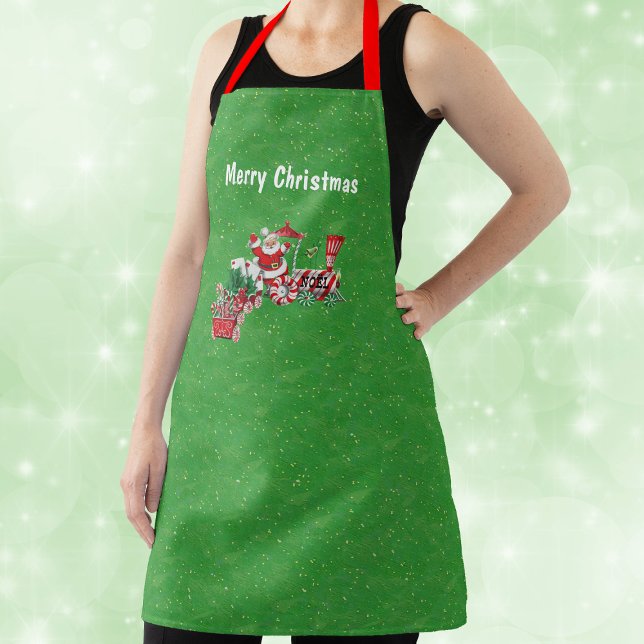 Christmas Train Peppermint Candy Wheels Santa Gold Apron (Santa on Merry Christmas Train with letters, candy canes on green with gold flecks kitchen apron.)