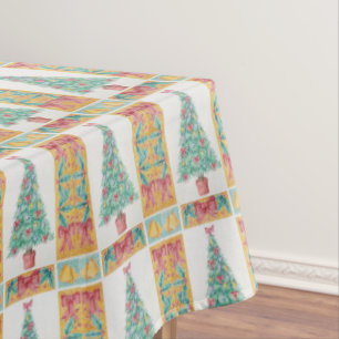 Christmas tree decoration with red bows gold bells tablecloth