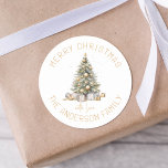 Christmas Tree Personalised Gift And Envelope Classic Round Sticker<br><div class="desc">This holiday season, dress up your gifts and cards with a touch of luxury and style. Our personalised stickers feature a modern Christmas tree adorned with golden baubles and presents, and are personalised with your family name for an extra special festive feel. Add a luxurious touch to your Christmas celebration...</div>