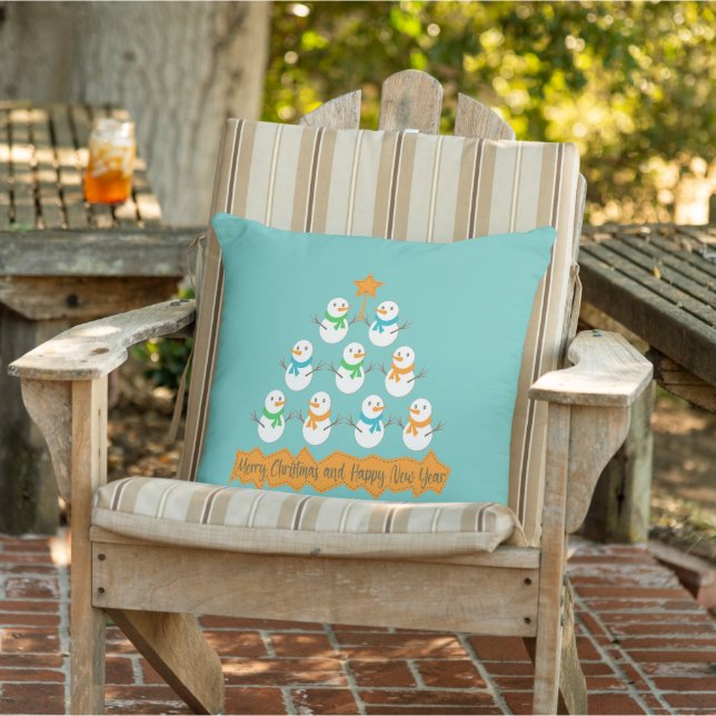 Christmas tree pyramid made of xmas snowmen cushion (Chair)
