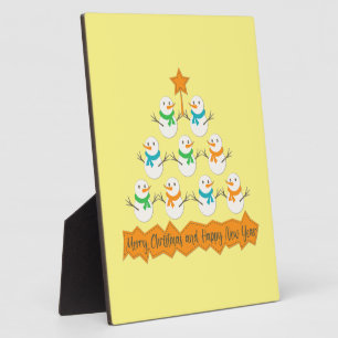 Christmas tree pyramid made of xmas snowmen plaque