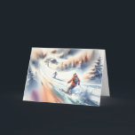 Christmas Watercolor Downhill Skiers Card<br><div class="desc">Skiers glide down a snowy slope,  surrounded by evergreen trees,  with a ski lift visible in the background,  depicted in watercolor.
The inside text is editable.</div>