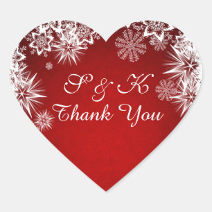 Christmas white snowflakes on red heart shaped sticker