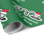 Christmas wrapping paper | Santa hat golf ball<br><div class="desc">Merry Christmas wrapping paper with Santa hat golf ball. Cute Holiday design for golfers,  golf players and sport fans. Funny Xmas gift wrap for golfing men,  women and kids (boys and girls). Personalizable with custom name and greeting. Green and red colours. Background colour is customisable.</div>