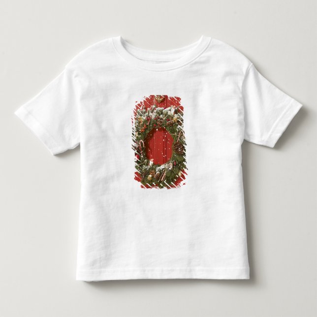 Christmas wreath hanging on a door toddler T-Shirt (Front)