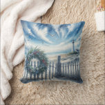 Christmas Wreath On a Beach Fence Cushion<br><div class="desc">A wreath decorated with seashells and greenery adorns a wooden fence,  while a lighthouse stands near the ocean under a sky filled with dramatic clouds and soaring seagulls</div>