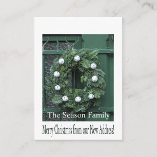 Christmas wreath on door new address enclosure card