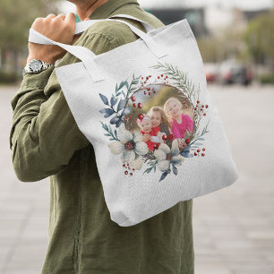 Christmas wreath, white flowers, red berries photo tote bag