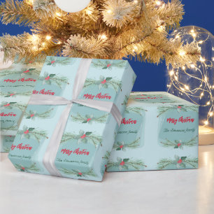 Christmas wreath with holly and spruce branches. wrapping paper