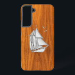 Chrome Silver Sailing on Teak Veneer Decor Samsung Galaxy Case<br><div class="desc">A silver chrome like sail boat scene on a teak wood grain style background decor. A racy modern nautical gift. 
 




 
Use the "Ask this Designer" link to contact us with your special design requests or for some assistance with any of your customisation projects.</div>