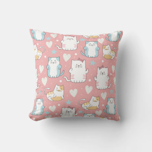 chubby cats in pastel blue, white, and pink cushion