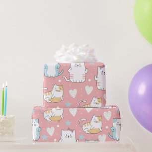 chubby cats in pastel blue, white, and pink wrapping paper