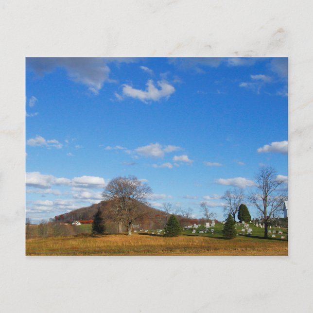 Church and Cemetery Under a Blue Sky Postcard (Front)