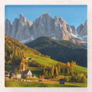 Church and village with mountains landscape glass coaster