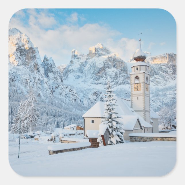 Church covered in snow with mountain background square sticker (Front)