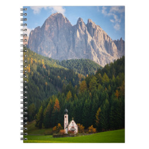 Church in front of Dolomites mountains in Italy Notebook