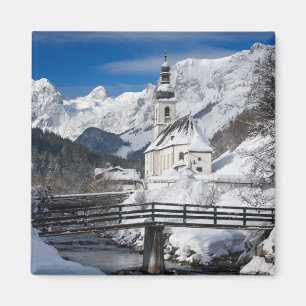 Church in the snow with Alps mountains Magnet