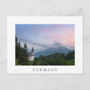 Church with Alps mountains at sunset Postcard
